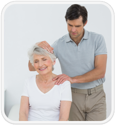 chiropractor treating older patient